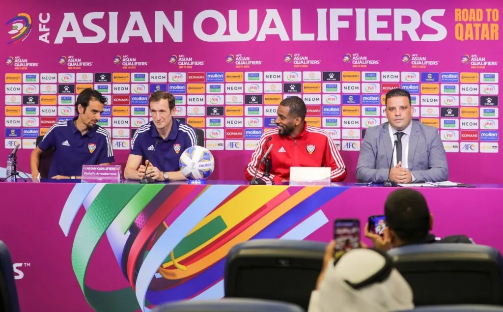 Football interpreter during a press conference
